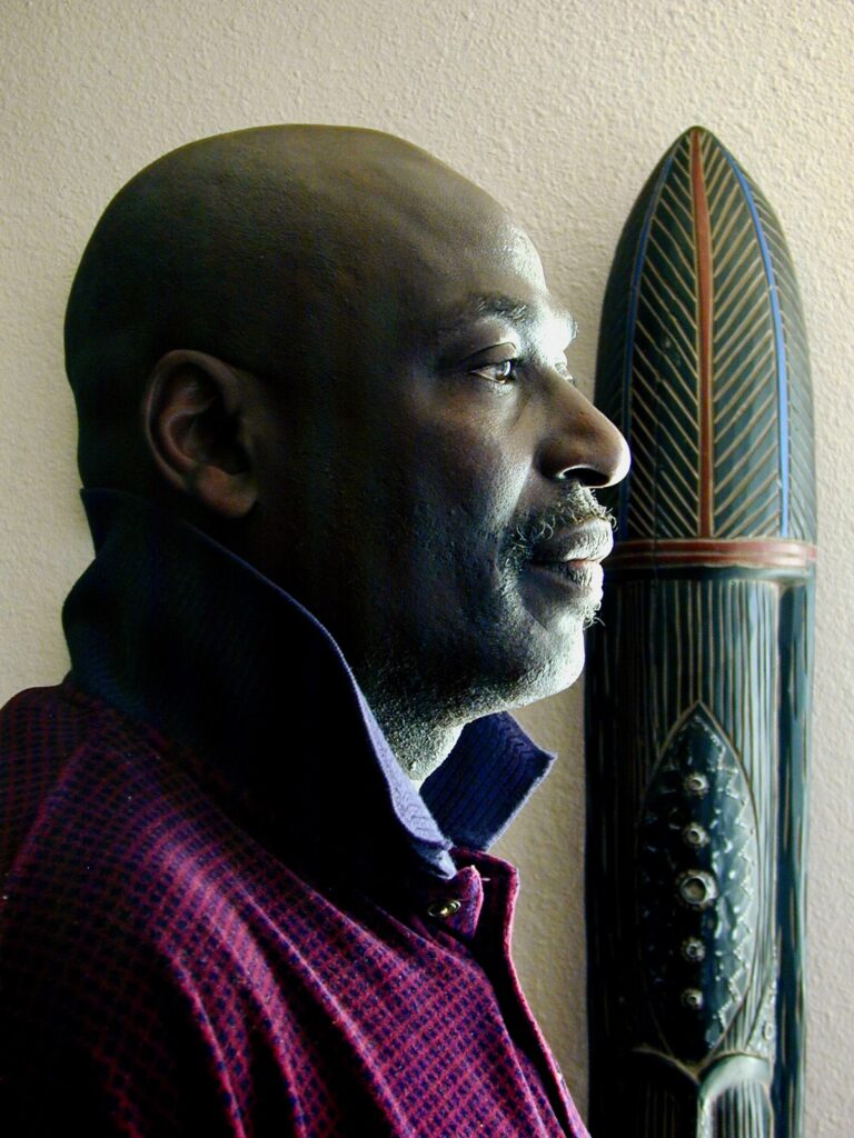 Joe’s testimony reads like a Hollywood movie script; Joe, a former Nigerian Olympian and the son of a voodoo high priest, enlists in the Nigerian Civil War at 12 years old and fights against his estranged father, who served the oppressive government. Before we hear about Joe’s heroic war story, we get a glimpse of his beginnings as a child in a voodoo culture.